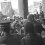 TUA35 Dental nurses from all over the country marched to Parliament in March 1974, to pressure the Government to restore their wage relativity with public health nurses. MPs were heard to comment: “It’s marvellous. They are so neat and tidy.” In any event they won relativity. Nurses crowd the doors at Parliament. <br /><br />KEITH STEWART TUA35 <br/><br/> Jim Delahunty at rear of photo.