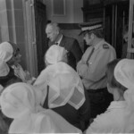 TUA69 Dental nurses from all over the country marched to Parliament in March 1974, to pressure the Government to restore their wage relativity with public health nurses. MPs were heard to comment: “It’s marvellous. They are so neat and tidy.” In any event they won relativity. Nurses try to gain access to Parliment buildings<br /><br />KEITH STEWART TUA71