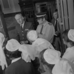 TUA70 Dental nurses from all over the country marched to Parliament in March 1974, to pressure the Government to restore their wage relativity with public health nurses. MPs were heard to comment: “It’s marvellous. They are so neat and tidy.” In any event they won relativity. Nurses try to gain access to Parliment buildings<br /><br />KEITH STEWART TUA72