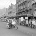 Kindergarten trainee teachers march to Parliament in Wellington in April 1974 . They were a part of a nationwide protest of over 1000 students against the low level of their salaries compared to primary school trainee teacher salaries and the unemployment benefit. TUAEC3