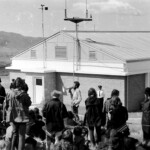 300 demonstrators, mostly young and students gathered from all over New Zealand at the Post Office in Timaru, on the East Coast of the South Island, They marched from there along the waterfront to Caroline Bay, a distance of about one mile.
From Caroline Bay the demonstrators moved out of town to Washdyke, about 3 miles to the north the site of the logistic end supply base for the Mt. John installation.