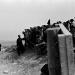 300 demonstrators, mostly young and students gathered from all over New Zealand at the Post Office in Timaru, on the East Coast of the South Island, They marched from there along the waterfront to Caroline Bay, a distance of about one mile.
From Caroline Bay the demonstrators moved out of town to Washdyke, about 3 miles to the north the site of the logistic end supply base for the Mt. John installation.