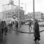 In Wellington workers stop work and march to the Employers Federation office protesting about the use of injunctions preventing workers withdrawing there labour. The march was also in solidarity with Bill Andersen imprisoned for defying a Supreme Court injunction.
