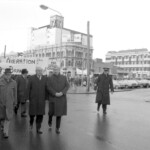 In Wellington workers stop work and march to the Employers Federation office protesting about the use of injunctions preventing workers withdrawing there labour. The march was also in solidarity with Bill Andersen imprisoned for defying a Supreme Court injunction.
