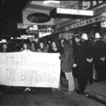 American Independence Day ball in 1973 at the Majestic Cabaret, Willis St, Wellington. Demonstrators voice their disagreement with USA involvement in the Vietnam war.