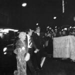 American Independence Day ball in 1973 at the Majestic Cabaret, Willis St, Wellington. Demonstrators voice their disagreement with USA involvement in the Vietnam war.
