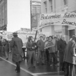 In Wellington workers stop work and march to the Employers Federation office protesting about the use of injunctions preventing workers withdrawing there labour. The march was also in solidarity with Bill Andersen imprisoned for defying a Supreme Court injunction.