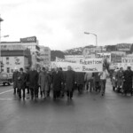 In Wellington workers stop work and march to the Employers Federation office protesting about the use of injunctions preventing workers withdrawing there labour. The march was also in solidarity with Bill Andersen imprisoned for defying a Supreme Court injunction.