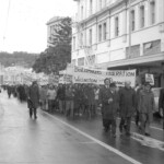 In Wellington workers stop work and march to the Employers Federation office protesting about the use of injunctions preventing workers withdrawing there labour. The march was also in solidarity with Bill Andersen imprisoned for defying a Supreme Court injunction.