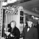 American Independence Day ball in 1973 at the Majestic Cabaret, Willis St, Wellington. Demonstrators voice their disagreement with USA involvement in the Vietnam war.