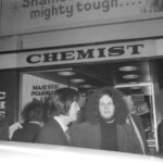 American Independence Day ball in 1973 at the Majestic Cabaret, Willis St, Wellington. Demonstrators voice their disagreement with USA involvement in the Vietnam war.