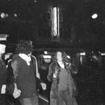 American Independence Day ball in 1973 at the Majestic Cabaret, Willis St, Wellington. Demonstrators voice their disagreement with USA involvement in the Vietnam war.