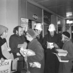 American Independence Day ball in 1973 at the Majestic Cabaret, Willis St, Wellington. Demonstrators voice their disagreement with USA involvement in the Vietnam war.
