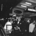 American Independence Day ball in 1973 at the Majestic Cabaret, Willis St, Wellington. Demonstrators voice their disagreement with USA involvement in the Vietnam war.
