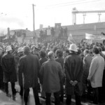 In Wellington workers stop work and march to the Employers Federation office protesting about the use of injunctions preventing workers withdrawing there labour. The march was also in solidarity with Bill Andersen imprisoned for defying a Supreme Court injunction.