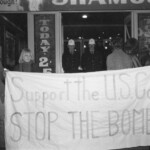 American Independence Day ball in 1973 at the Majestic Cabaret, Willis St, Wellington. Demonstrators voice their disagreement with USA involvement in the Vietnam war.