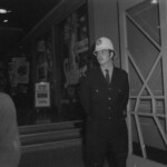American Independence Day ball in 1973 at the Majestic Cabaret, Willis St, Wellington. Demonstrators voice their disagreement with USA involvement in the Vietnam war.