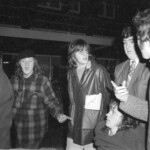 American Independence Day ball in 1973 at the Majestic Cabaret, Willis St, Wellington. Demonstrators voice their disagreement with USA involvement in the Vietnam war.