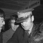 American Independence Day ball in 1973 at the Majestic Cabaret, Willis St, Wellington. Demonstrators voice their disagreement with USA involvement in the Vietnam war.