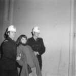 American Independence Day ball in 1973 at the Majestic Cabaret, Willis St, Wellington. Demonstrators voice their disagreement with USA involvement in the Vietnam war.