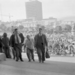 Workers from the Seamens Union and Drivers Union marched to Parliament in June 1974. They were protesting about a number of issues including cost of living and anti-union legislation being introduced that allowed injunctions on Unions supporting other unions. Unions executives walk up Parliament steps to a meeting with the Government. Dave Morgan in the centre