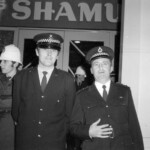 American Independence Day ball in 1973 at the Majestic Cabaret, Willis St, Wellington. Demonstrators voice their disagreement with USA involvement in the Vietnam war.