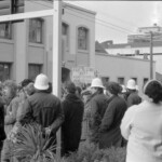 In Wellington workers stop work and march to the Employers Federation office protesting about the use of injunctions preventing workers withdrawing there labour. The march was also in solidarity with Bill Andersen imprisoned for defying a Supreme Court injunction.