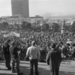 Workers from the Seamens Union and Drivers Union marched to Parliament in June 1974. They were protesting about a number of issues including cost of living and anti-union legislation being introduced that allowed injunctions on Unions supporting other unions.