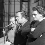Workers from the Seamens Union and Drivers Union marched to Parliament in June 1974. They were protesting about a number of issues including cost of living and anti-union legislation being introduced that allowed injunctions on Unions supporting other unions. Ken Douglas from the Drivers Union at the microphone