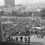 Workers from the Seamens Union and Drivers Union marched to Parliament in June 1974. They were protesting about a number of issues including cost of living and anti-union legislation being introduced that allowed injunctions on Unions supporting other unions.